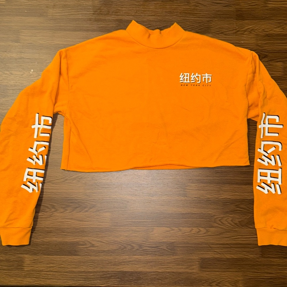 Orange cropped graphic crew neck